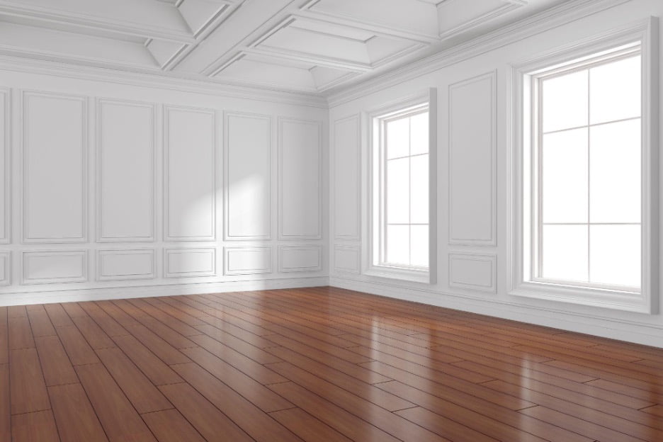 Simple room with white walls and wooden floors.